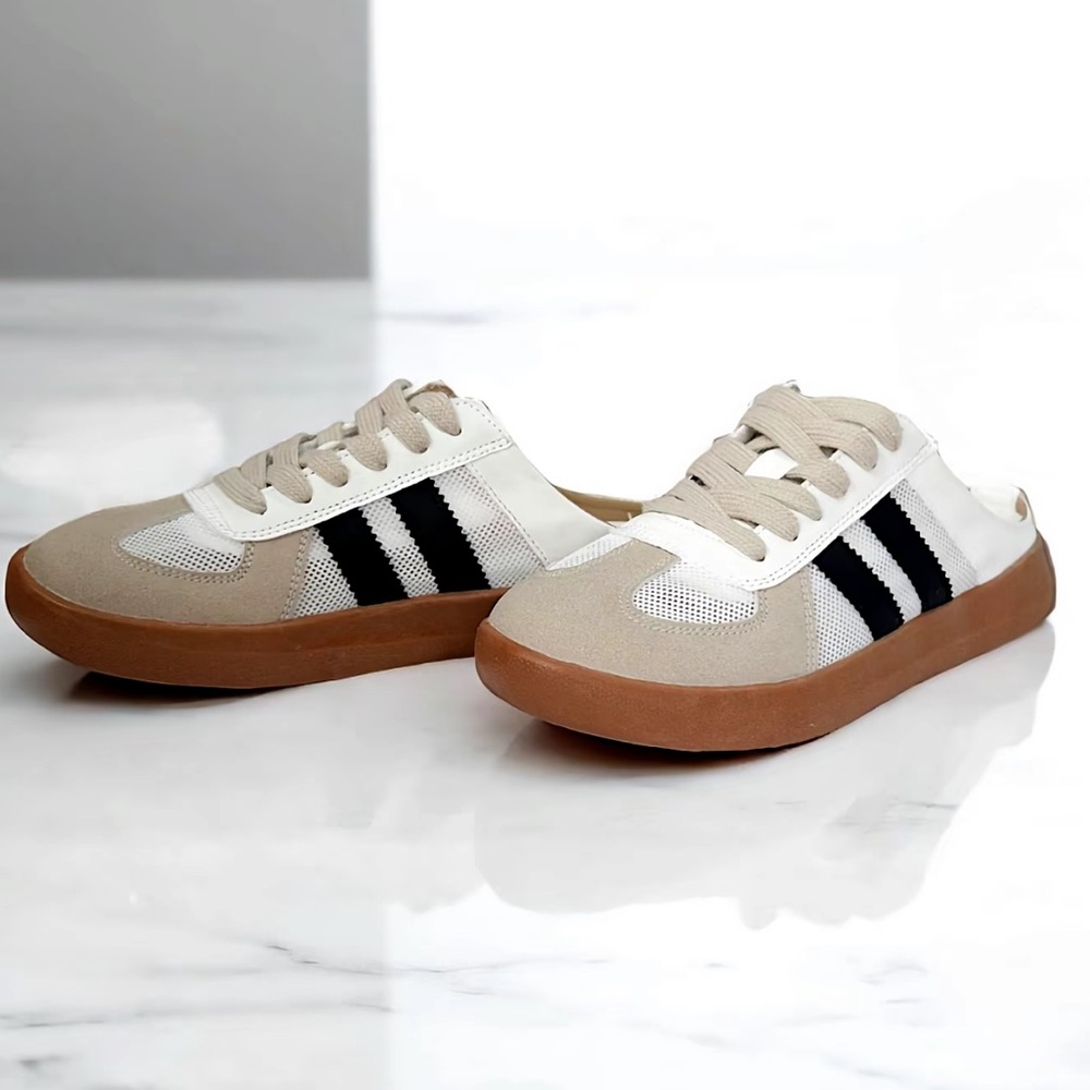 Stylish Beige and White Sneakers with Black Stripes